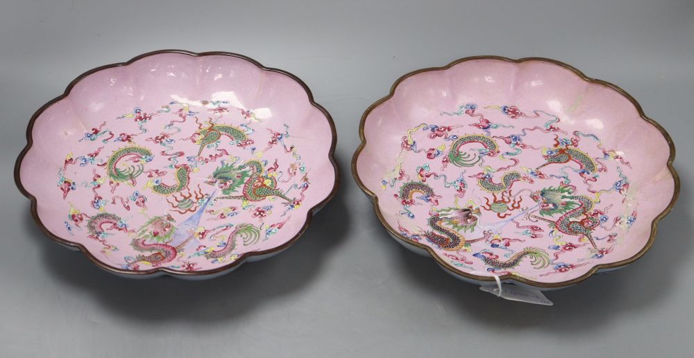 A pair of 19th century Canton enamel dragon dishes, diameter 27cm